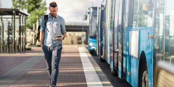 Man Walking By Bus (1)