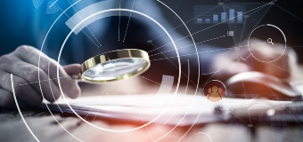 Magnifying Glass Over Laptop (1)